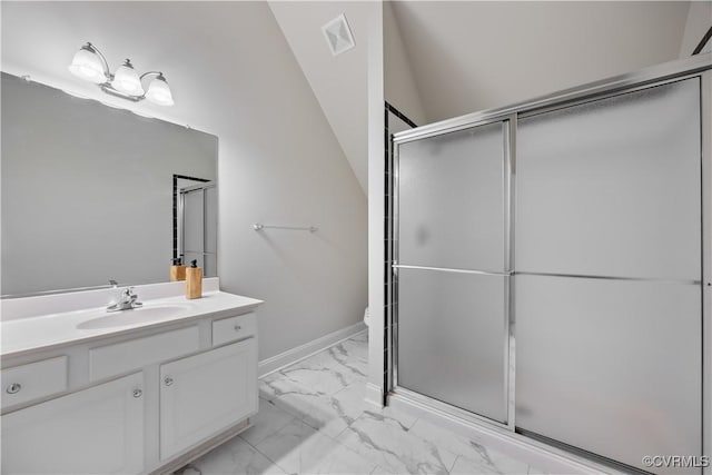 full bathroom featuring a shower with door, visible vents, marble finish floor, and vanity