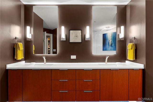 bathroom with double vanity and a sink