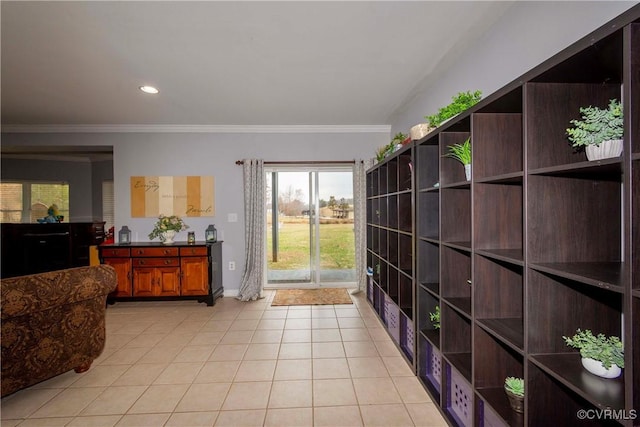 interior space featuring light tile patterned flooring, recessed lighting, baseboards, and ornamental molding