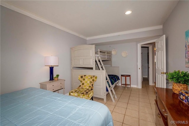 bedroom featuring crown molding, light tile patterned flooring, and baseboards