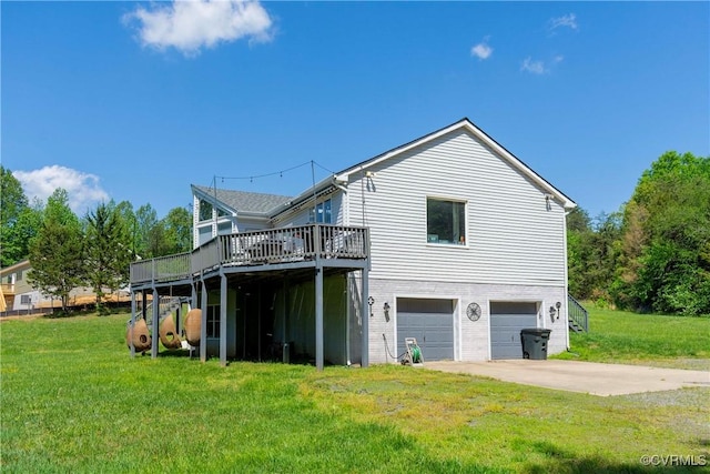 6210 Stubbs Cove Ln, Spotsylvania, VA 22551 - back of house with an attached garage, a lawn, driveway, and a deck