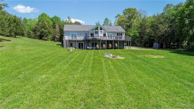6210 Stubbs Cove Ln, Spotsylvania, VA 22551 - rear view of house featuring a lawn, a shed, an outdoor structure, and a deck