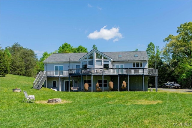 6210 Stubbs Cove Ln, Spotsylvania, VA 22551 - back of house with a yard, a wooden deck, stairs, and a fire pit