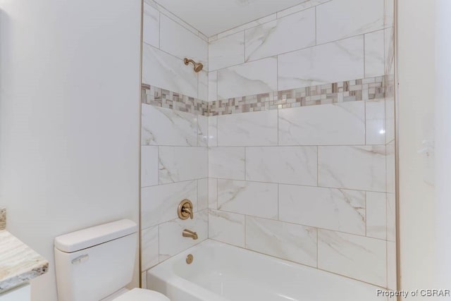 full bathroom with toilet and tub / shower combination