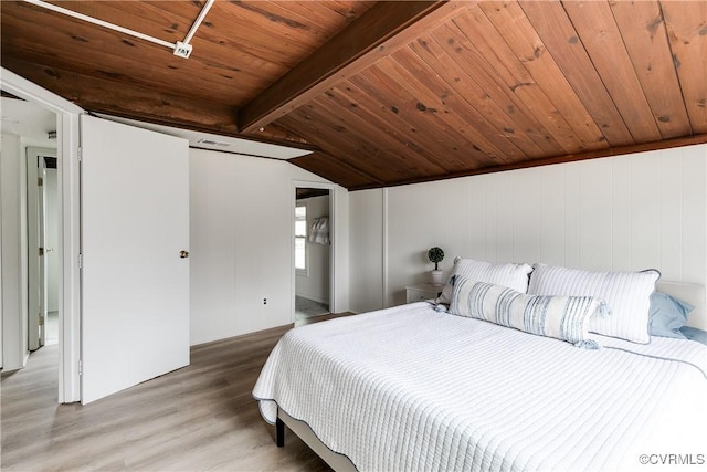 bedroom featuring vaulted ceiling with beams, wood ceiling, visible vents, and light wood finished floors