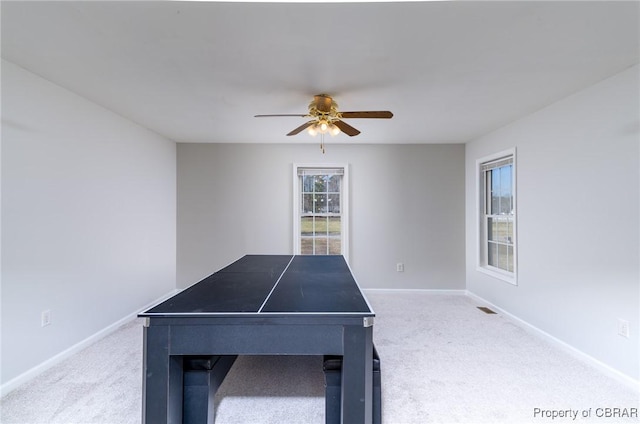 game room with visible vents, baseboards, a ceiling fan, and carpet floors