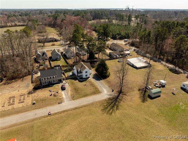 bird's eye view featuring a view of trees