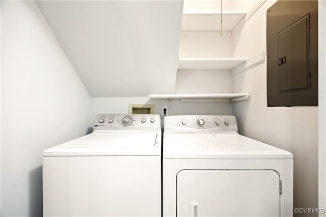 laundry area with electric panel, laundry area, independent washer and dryer, and attic access