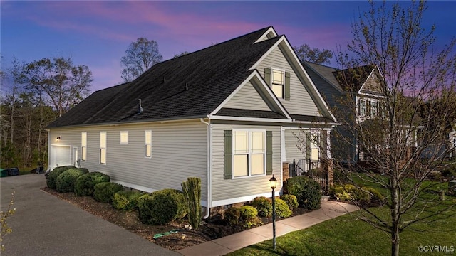 117 Giddy-Up Ln, Ashland, VA 23005 - view of side of home with a shingled roof and a garage