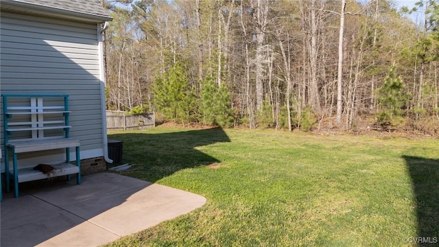 117 Giddy-Up Ln, Ashland, VA 23005 - view of grassy yard with a patio and a forest view