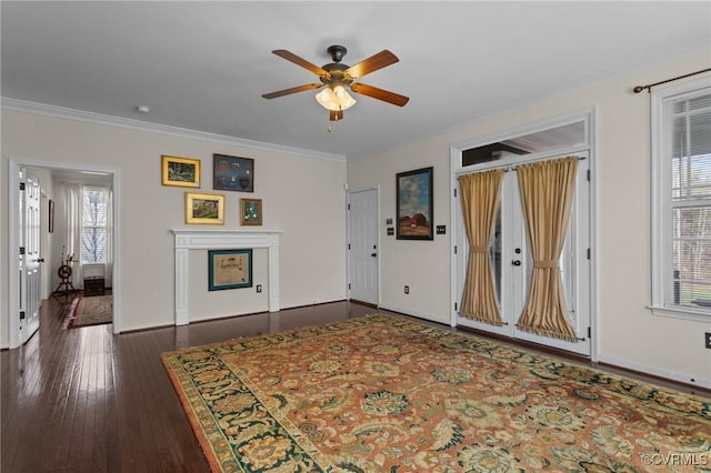 117 Giddy-Up Ln, Ashland, VA 23005 - unfurnished living room featuring ornamental molding, a ceiling fan, baseboards, and hardwood / wood-style floors