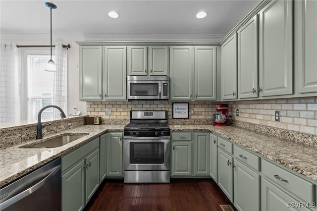 117 Giddy-Up Ln, Ashland, VA 23005 - kitchen featuring appliances with stainless steel finishes, a sink, light stone countertops, tasteful backsplash, and ornamental molding