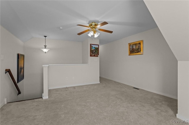 117 Giddy-Up Ln, Ashland, VA 23005 - spare room with carpet floors, vaulted ceiling, a ceiling fan, and baseboards