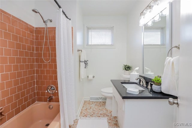 bathroom with tile patterned floors, visible vents, shower / tub combo with curtain, toilet, and vanity