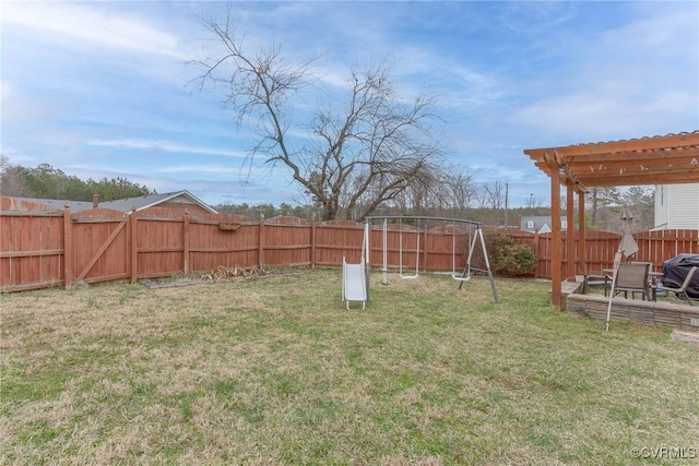 view of yard with a fenced backyard