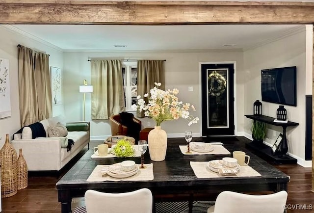 dining area with wood finished floors, baseboards, and ornamental molding