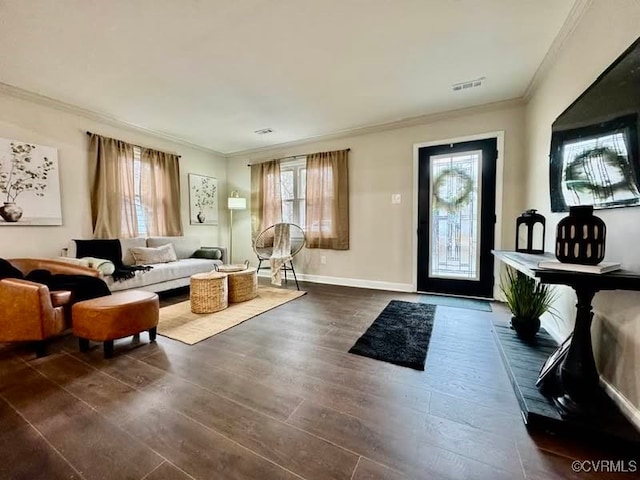 interior space featuring visible vents, plenty of natural light, dark wood finished floors, and crown molding