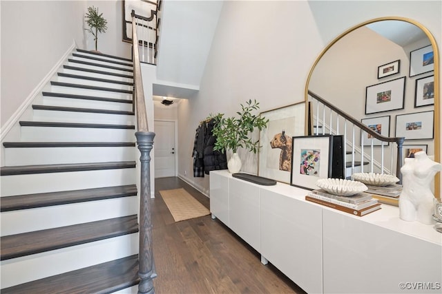 stairs with wood finished floors