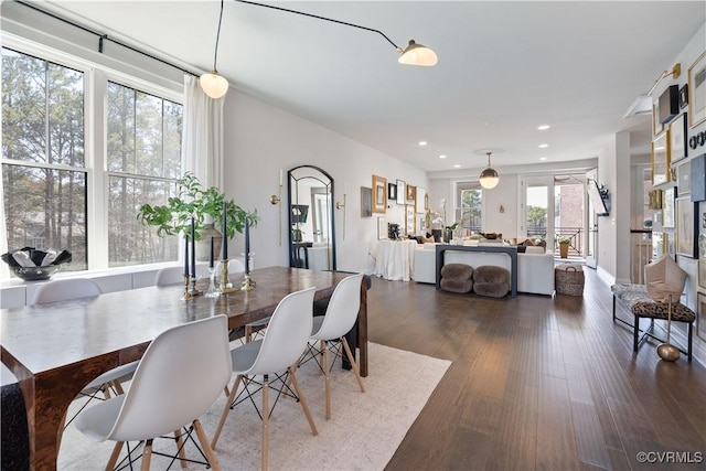 dining area featuring recessed lighting and dark wood-style flooring