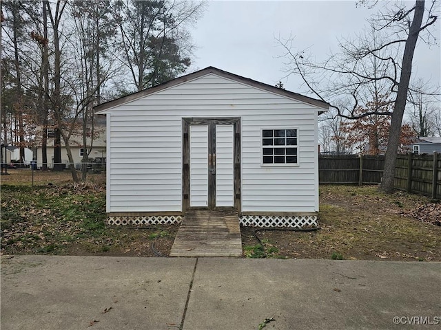 view of shed with a fenced backyard