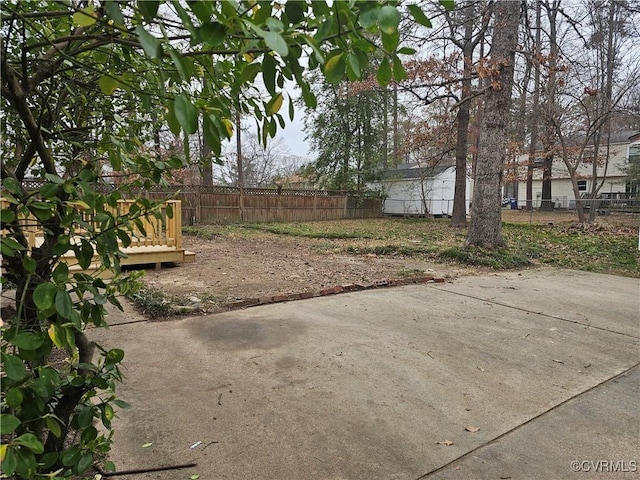 view of yard with a patio and fence