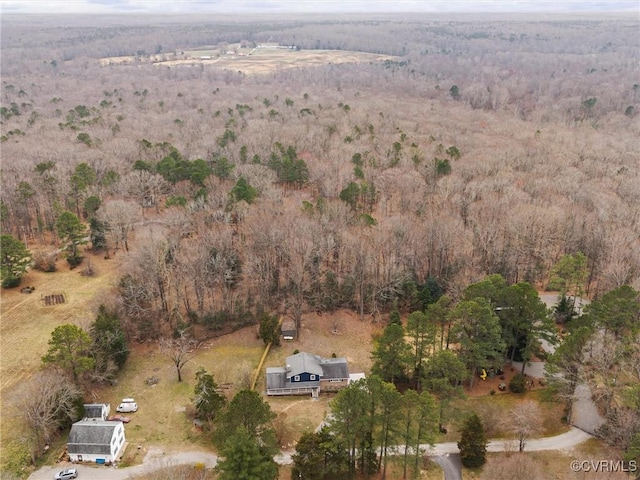 aerial view featuring a view of trees