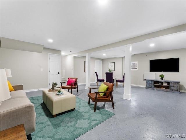 living room featuring recessed lighting and baseboards