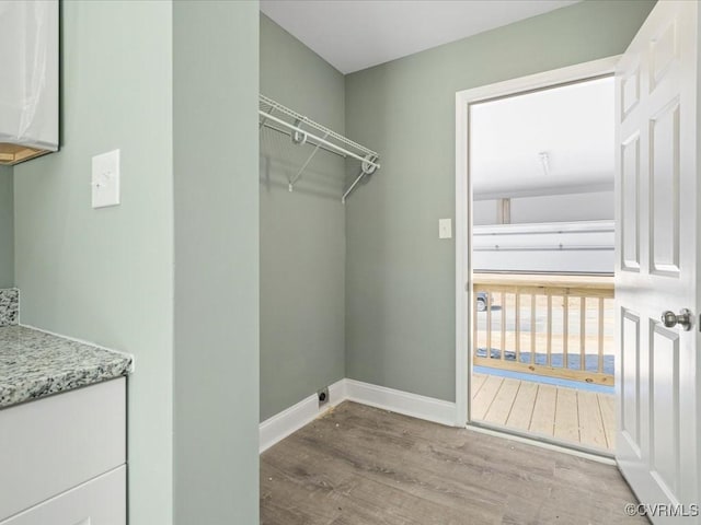 0 Silver Trail Cir, Lawrenceville, VA 23868 - laundry room with wood finished floors and baseboards