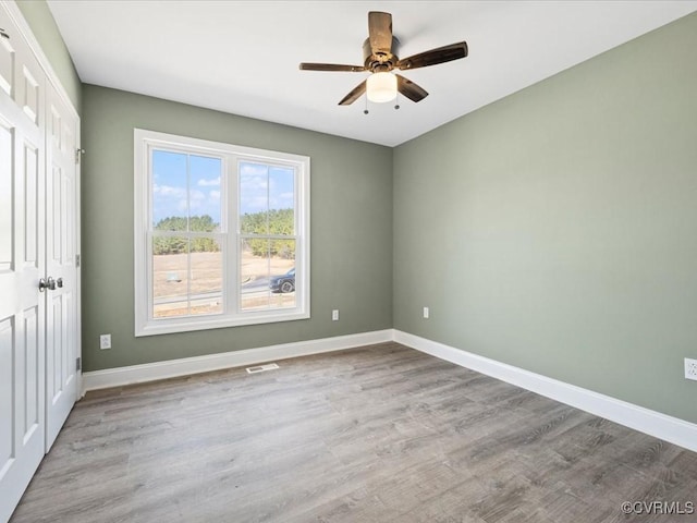 0 Silver Trail Cir, Lawrenceville, VA 23868 - empty room with baseboards, a ceiling fan, and wood finished floors