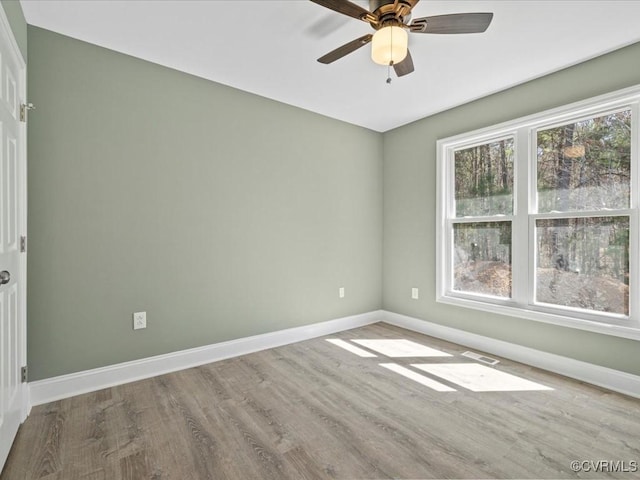 0 Silver Trail Cir, Lawrenceville, VA 23868 - unfurnished room with baseboards, wood finished floors, and a ceiling fan