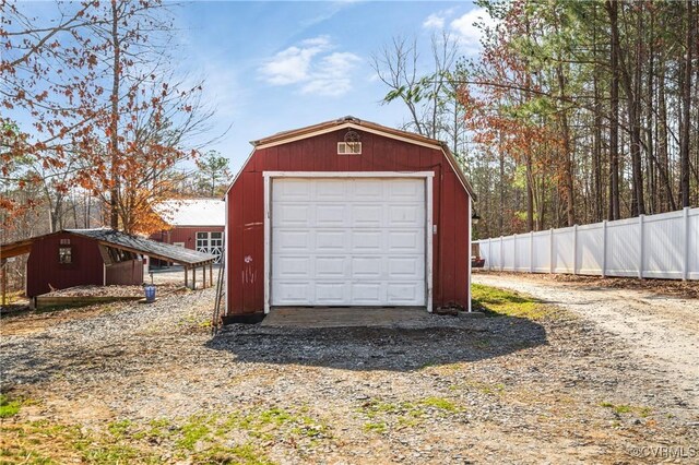 detached garage with fence