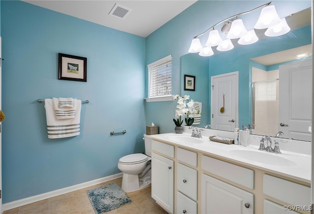 bathroom with a sink, visible vents, toilet, and a stall shower