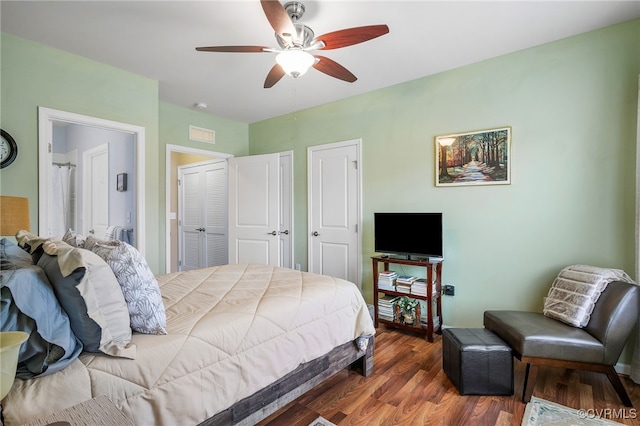 bedroom with wood finished floors and a ceiling fan