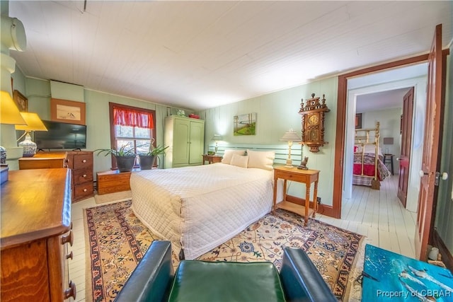 257 Horseshoe Bend Rd, Deltaville, VA 23043 - bedroom with light wood-style flooring