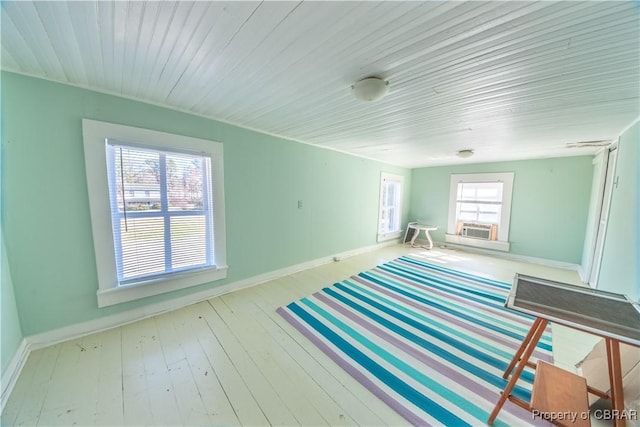 257 Horseshoe Bend Rd, Deltaville, VA 23043 - unfurnished living room featuring baseboards, cooling unit, wood finished floors, and wood ceiling