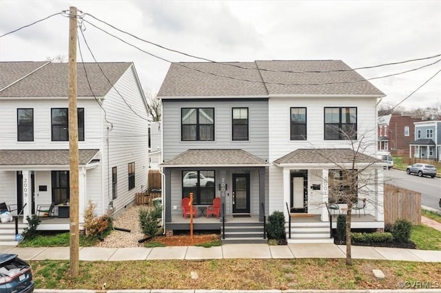 2005 R St, Richmond, VA 23223 - multi unit property with a porch and roof with shingles