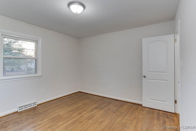 104 Clemwood Pkwy, Hampton, VA 23669 - unfurnished room featuring visible vents, baseboards, and light wood-style floors