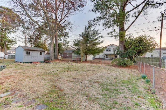 104 Clemwood Pkwy, Hampton, VA 23669 - view of yard with an outbuilding, a storage unit, and a fenced backyard