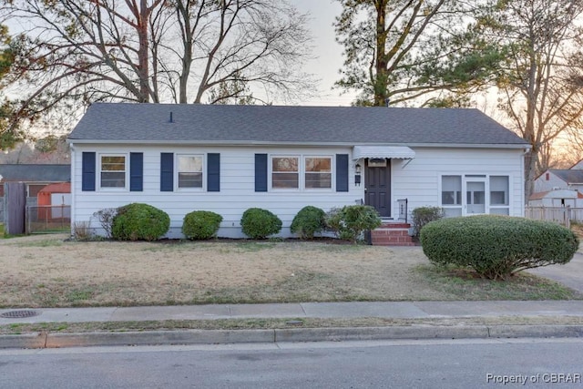 104 Clemwood Pkwy, Hampton, VA 23669 - view of front facade featuring roof with shingles and fence