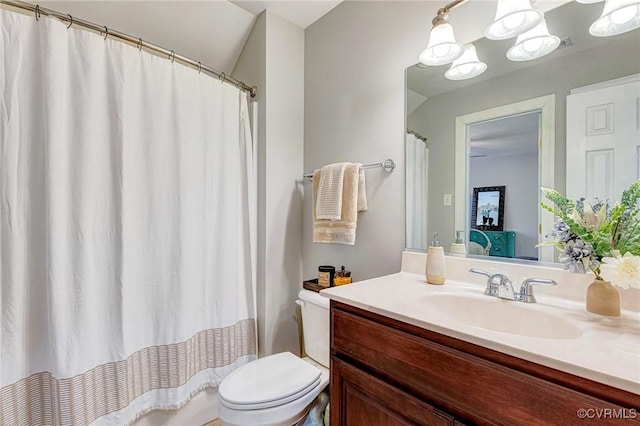 full bath with toilet and vanity