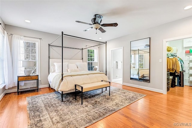 bedroom with baseboards, recessed lighting, a ceiling fan, and wood finished floors