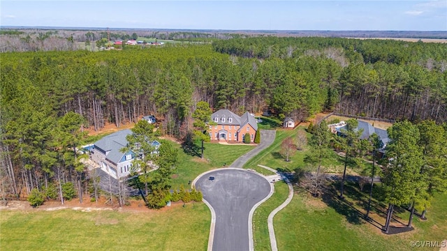 aerial view featuring a view of trees