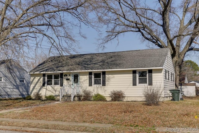 view of front of home with roof with shingles