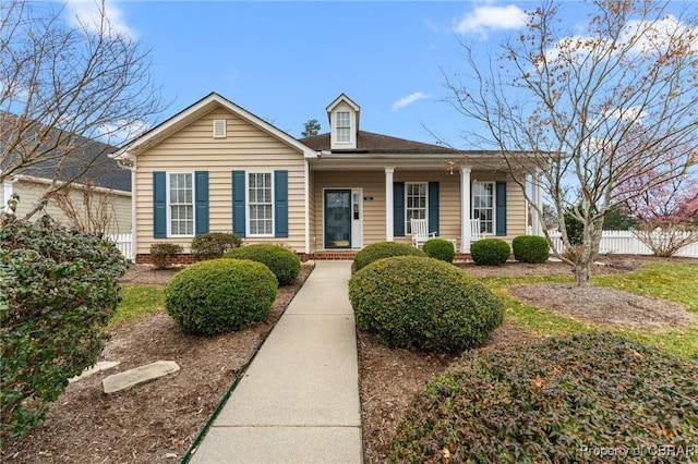 22 Crossroad, Irvington, VA 22480 - view of front of property featuring covered porch and fence