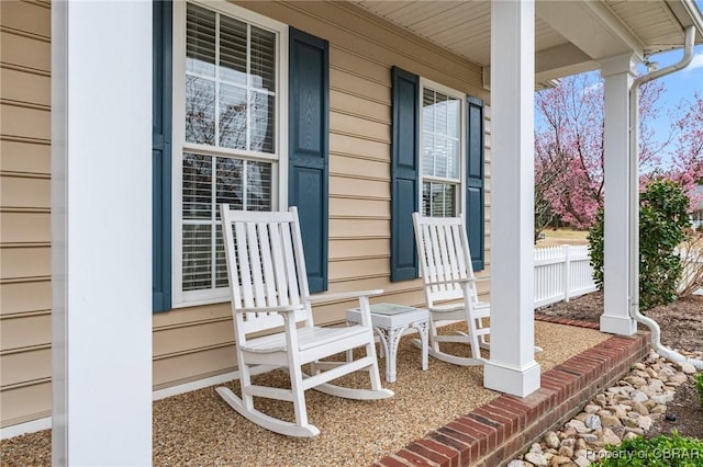 22 Crossroad, Irvington, VA 22480 - view of patio featuring fence and covered porch