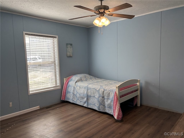 16690 Shands Rd, South Prince George, VA 23805 - bedroom with crown molding, wood finished floors, a decorative wall, a textured ceiling, and a ceiling fan