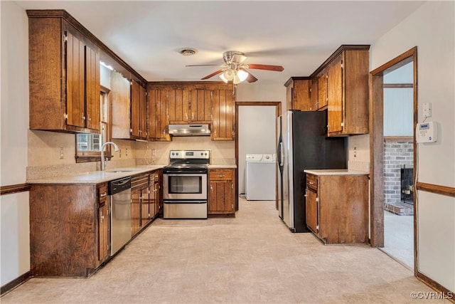 kitchen featuring a ceiling fan, visible vents, a sink, under cabinet range hood, and appliances with stainless steel finishes