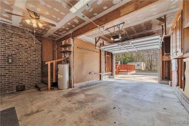 garage featuring a garage door opener and water heater