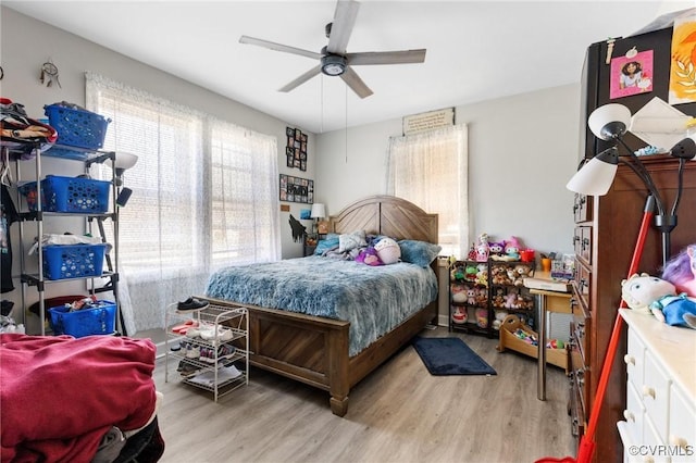 bedroom featuring ceiling fan and wood finished floors