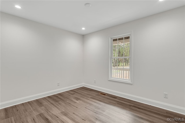 42 Mt Elba Rd, Columbia, VA 23038 - empty room with wood finished floors, recessed lighting, and baseboards